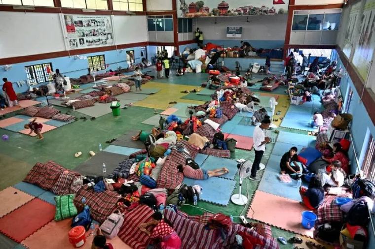 China en Nepal: Race tegen de tijd om duizenden vermisten te vinden